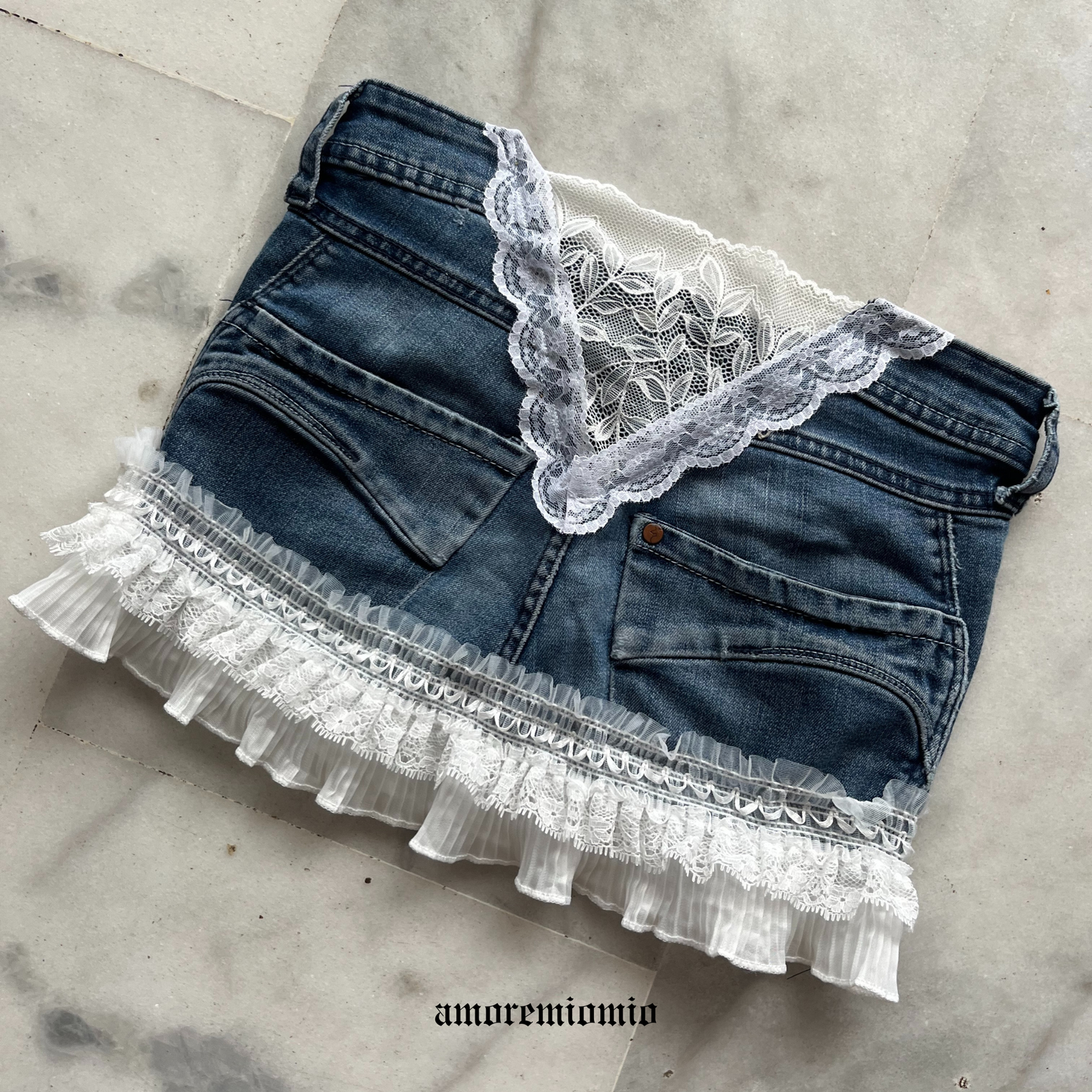 Low-Rise Style Reworked Denim Mini Skirt with Lace Details