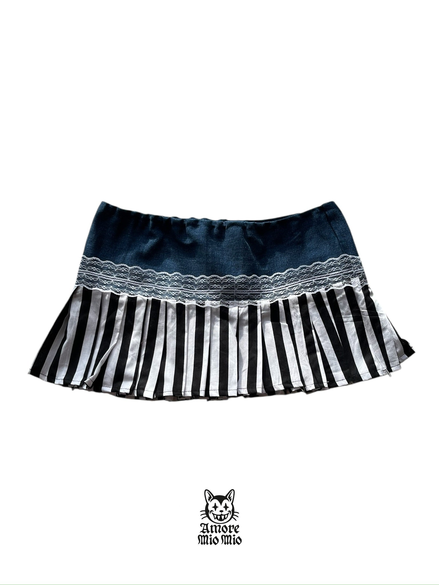 Mini falda de tiro bajo con pliegues