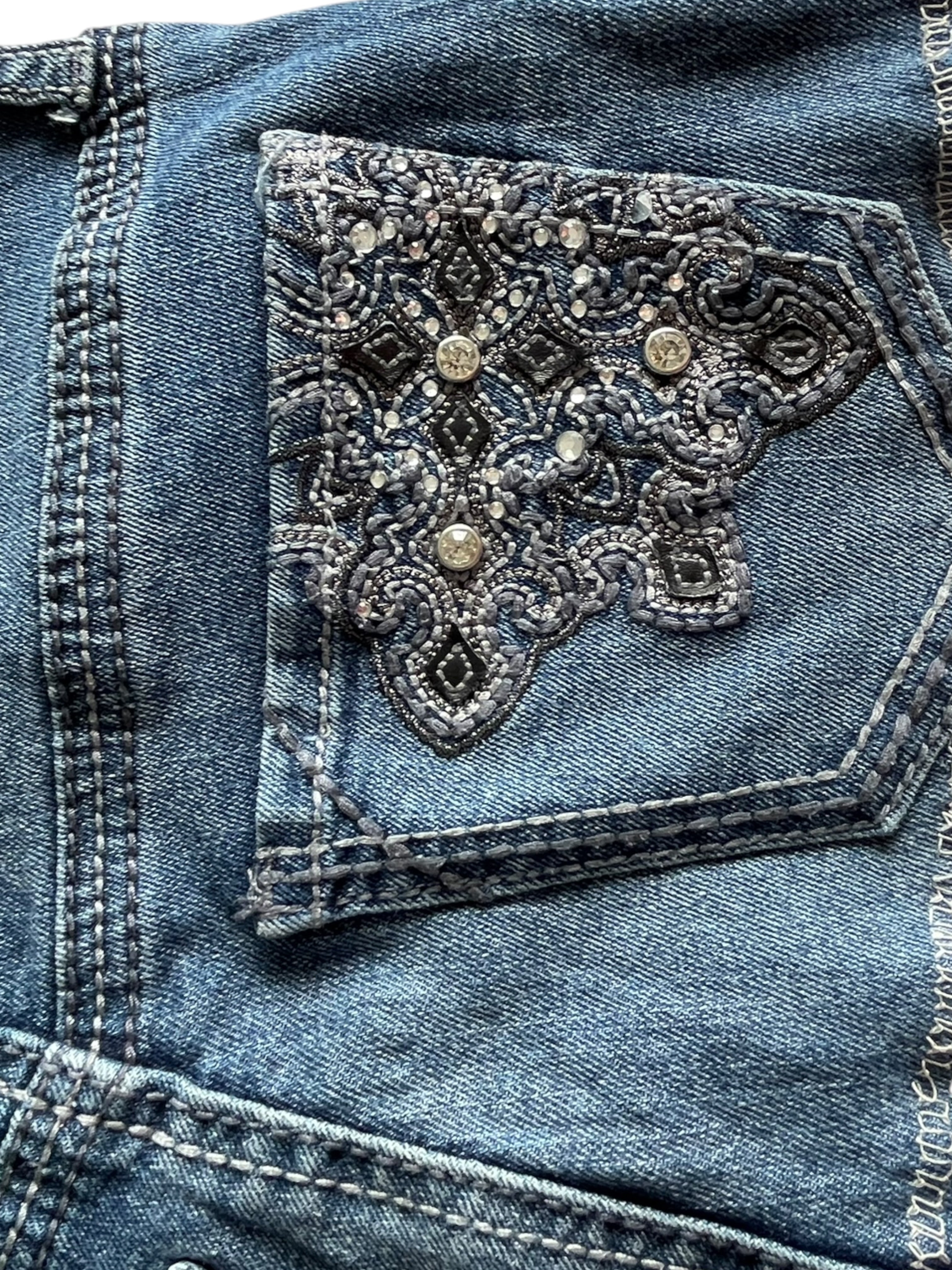 XSS Low-rise embroidered mini skirt