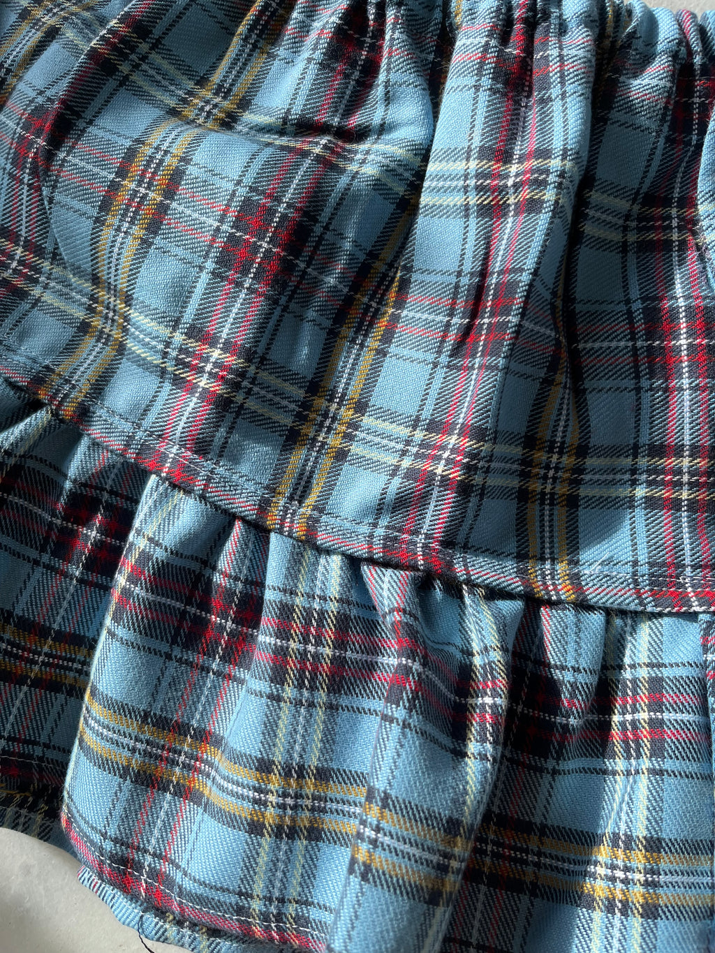 mini faldas de cuadros con calavera