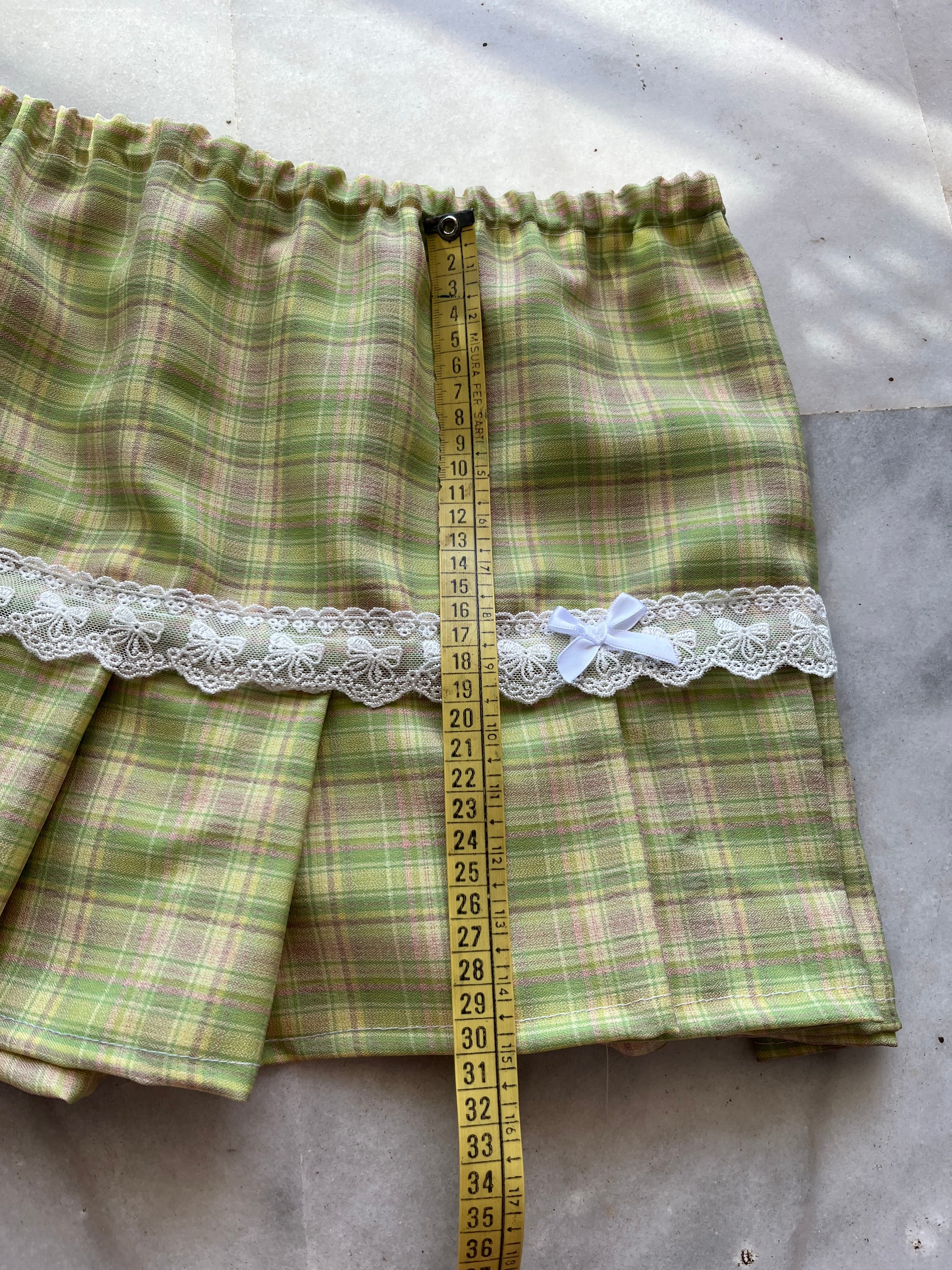 mini falda de estampados cuadros verdes con encaje