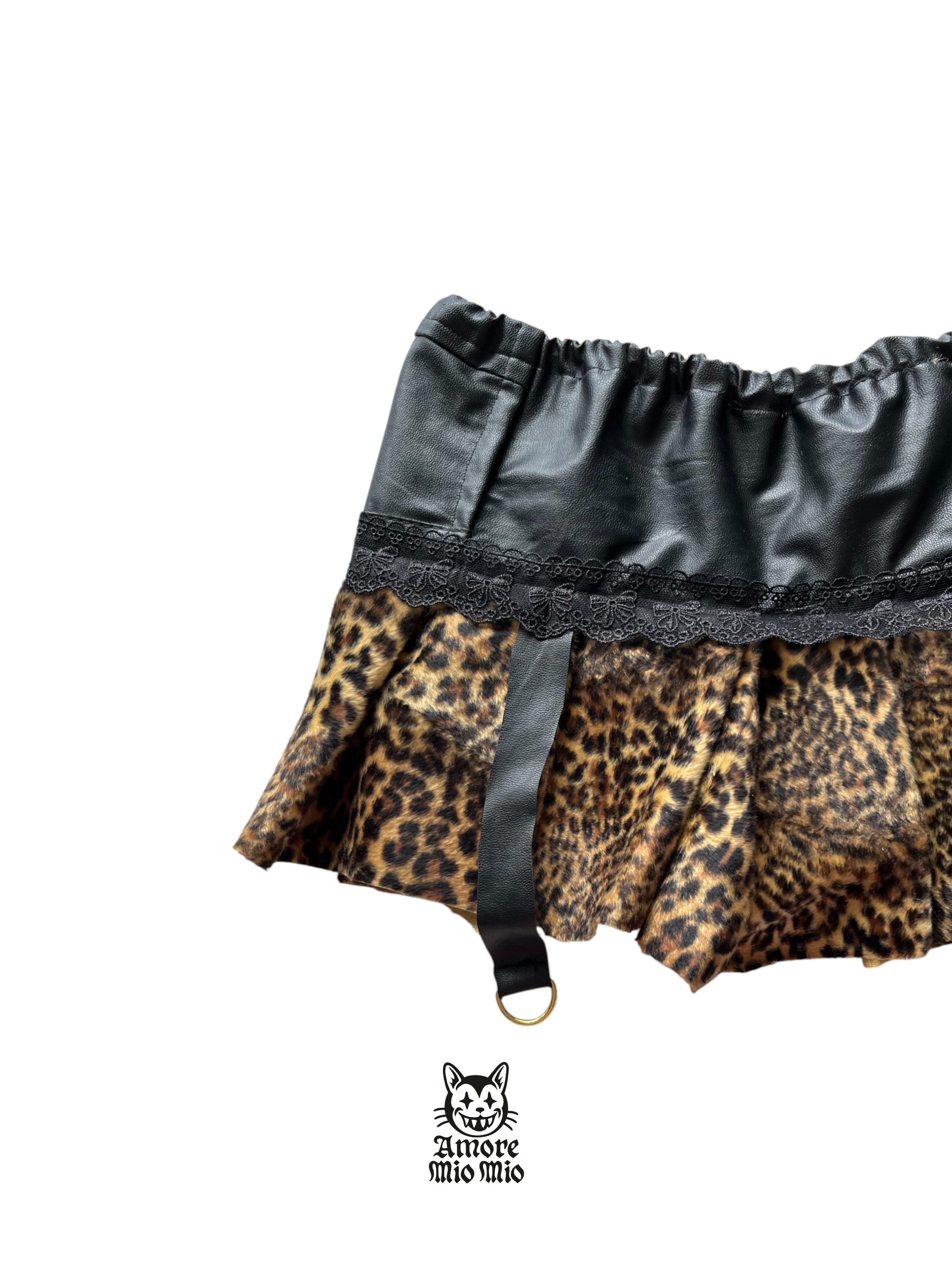 mini falda leopardo y cuero sintetico