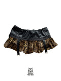 mini falda leopardo y cuero sintetico