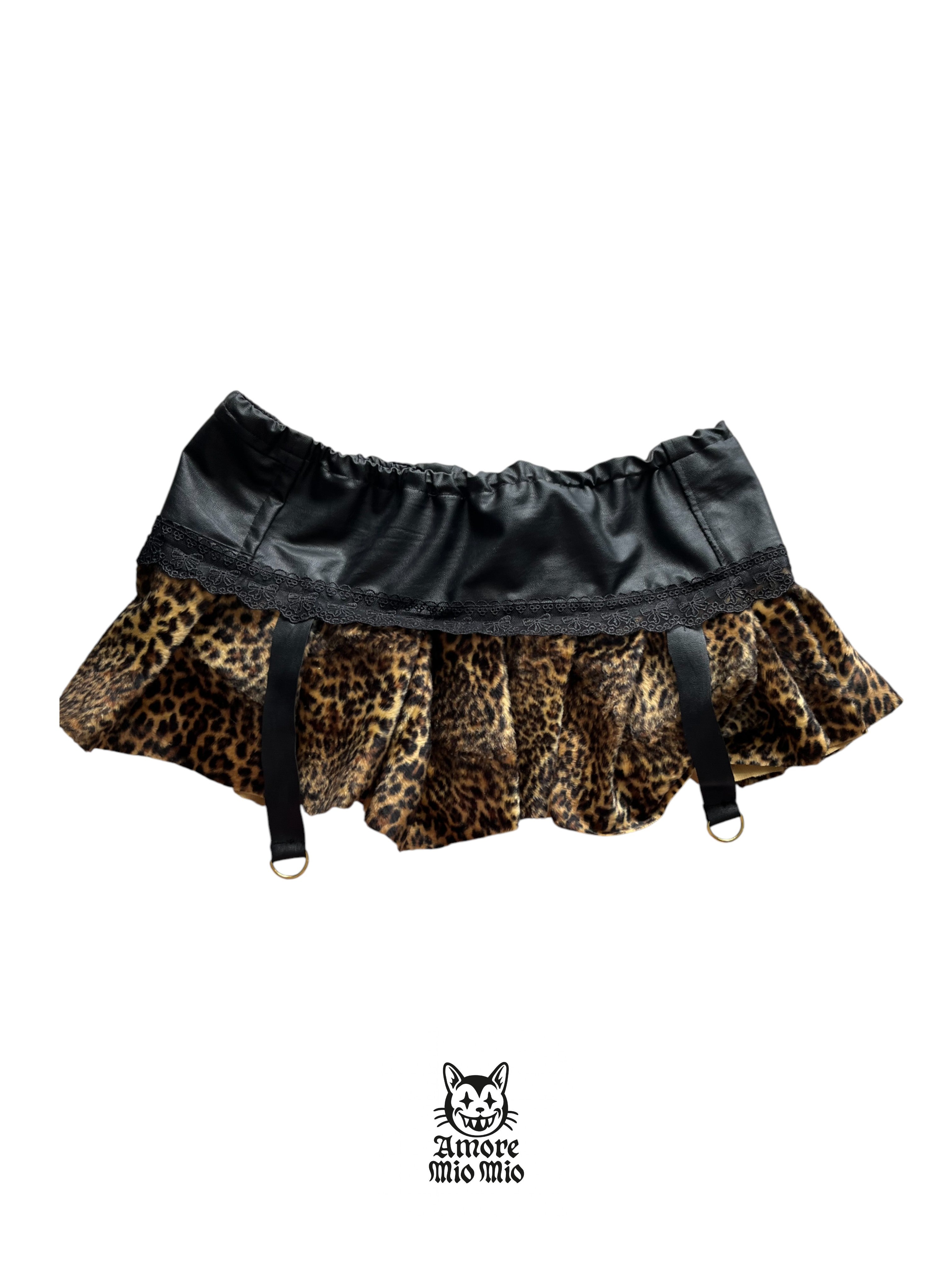mini falda leopardo y cuero sintetico