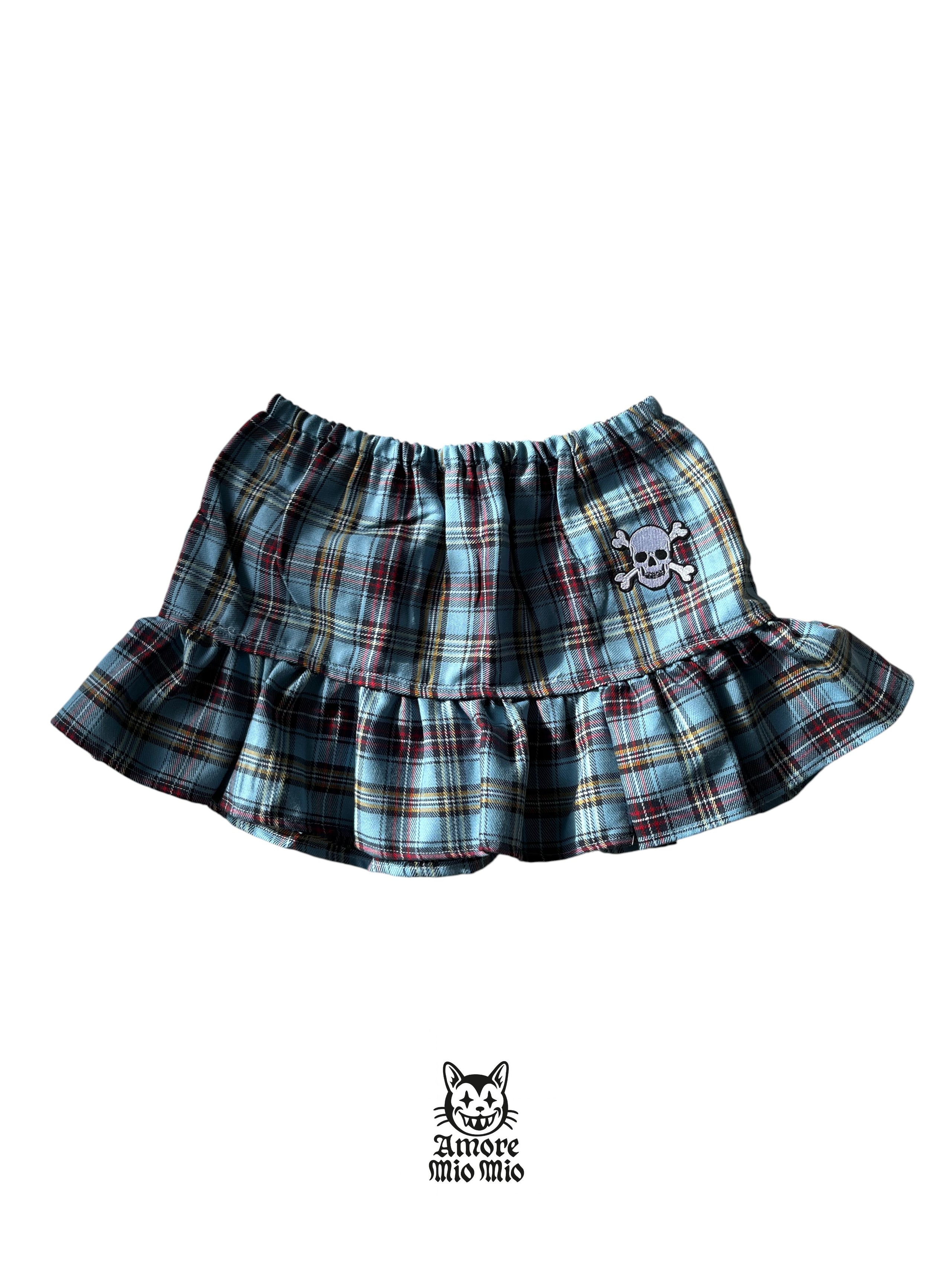 mini faldas de cuadros con calavera