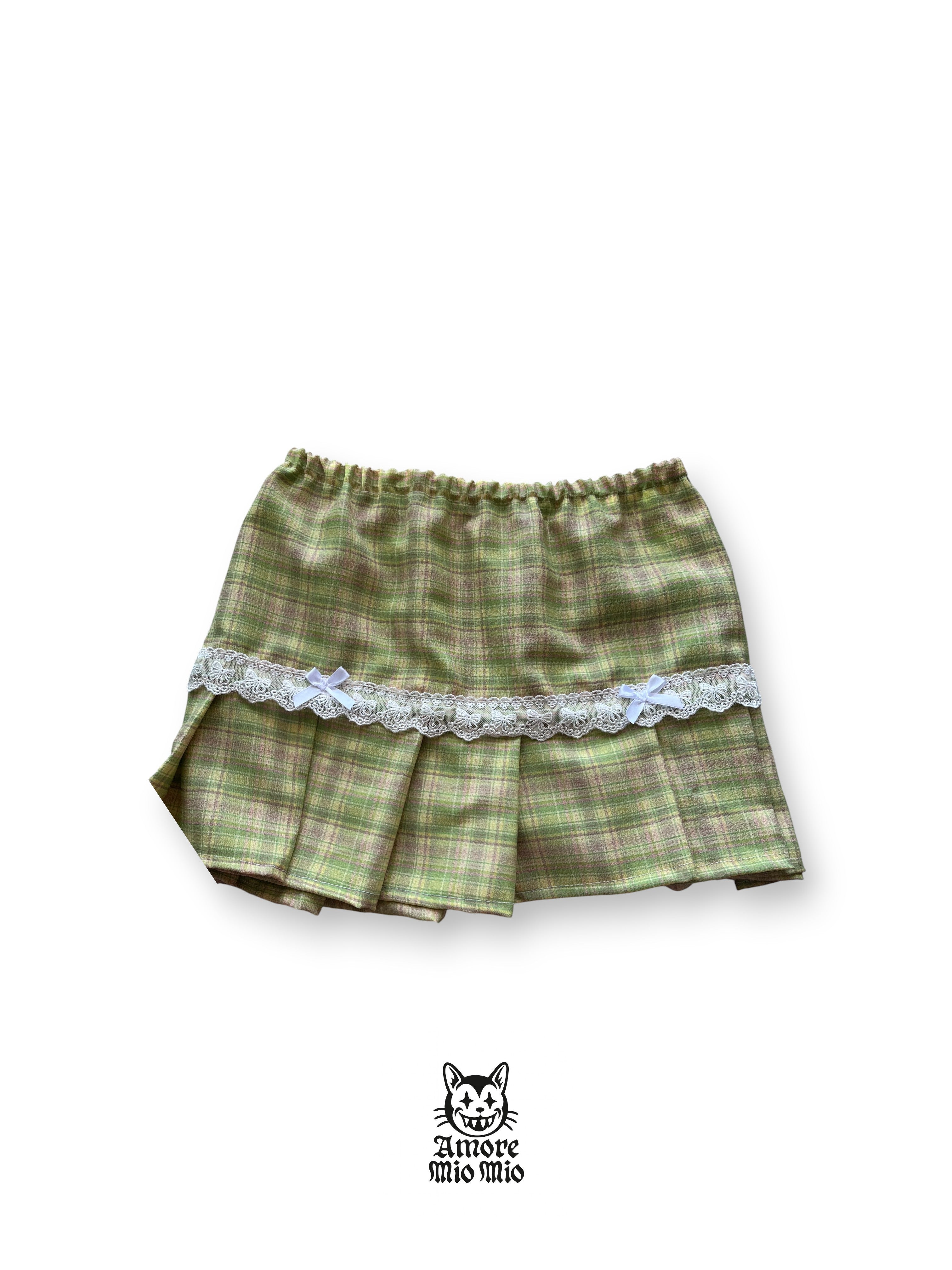 mini falda de estampados cuadros verdes con encaje
