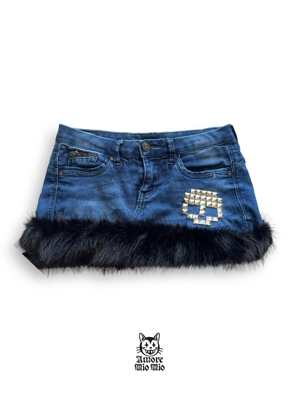 mini falda con pelo y calavera metalica